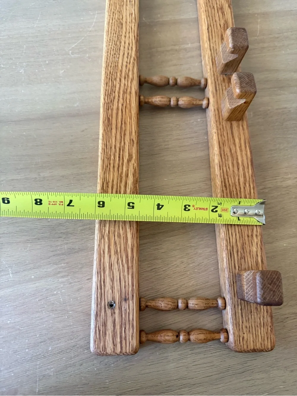 Vintage wooden hooks with charming spindle design